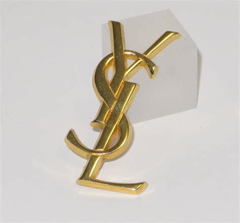 yves Saint Laurent pins